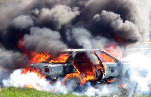 car on fire burning flames